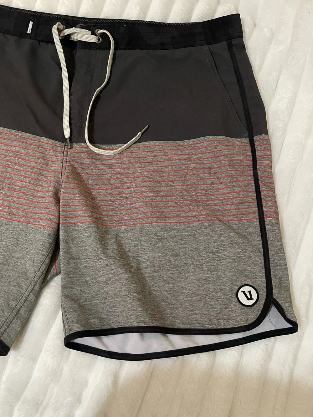 Vuori Men's Swim Shorts in Black with Dusty Rose Accent